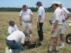 Thumbnail People_fixing_winch_Rich_W_supervises.jpg 